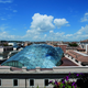 Illustration for article titled A Century-Old Roman Palazzo Grows a Faceted Glass-and-Steel Parasite